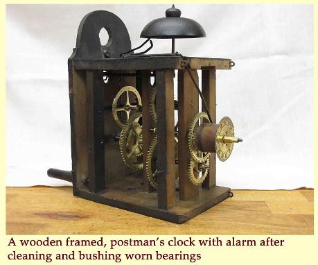 Wooden framed postman's clock